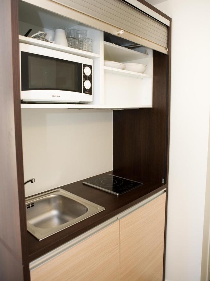 Hotel Residence Alaia อัสแก็ง ภายนอก รูปภาพ